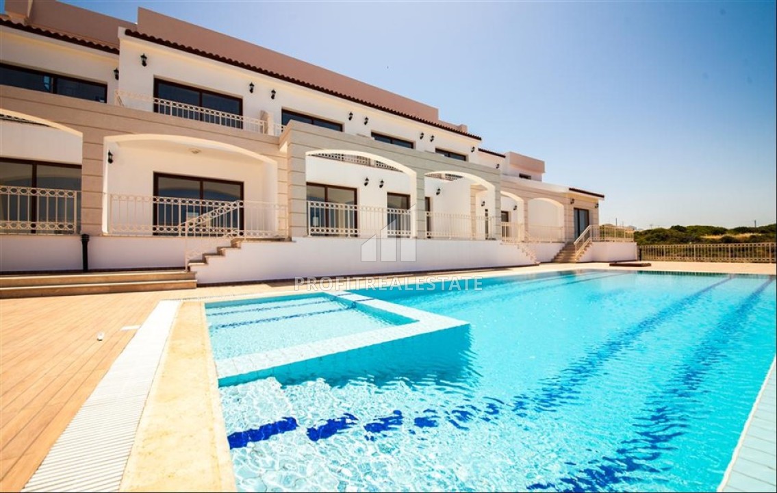 Двухкомнатные и трехкомнатные квартиры в жилом комплексе 2015 года, в 100 метрах от моря, Кирения, Северный Кипр, 52-77 м2 ID-13441 фото-1