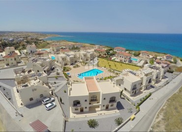 Апартаменты 1+1 и 2+1 в благоустроенной резиденции, в 100 метрах от пляжа, Бахчели, Кирения, Северный Кипр, 60-110 м2 ID-13443 фото-1