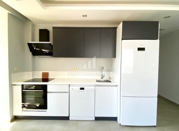 Stylish apartment 2 + 1, 100m², in a new residence with an excellent location in Ciftlikkoy, Mersin ID-13447 фото-6