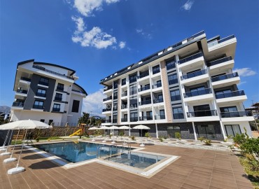 One bedroom apartment, 56m², in a new residence with facilities in Oba, Alanya ID-13475 фото-1