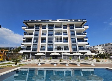 Трехкомнатная квартира, 86м², с видом на море и Аланийскую крепость в новой резиденции в районе Оба, Алания ID-13481 фото-1
