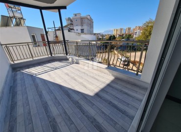 Недорогие двухуровневые апартаменты 4+1 с двумя отдельными кухнями, в новом доме без бассейна, в Кепезе, Анталия, 200 м2 ID-13523 фото-14