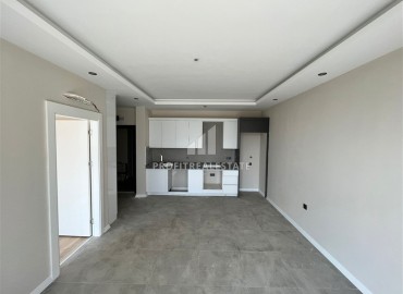 Новая двухкомнатная квартира, 61м², в комплексе с крытым бассейном в районе Алании – Каргыджак, 350м от моря ID-13525 фото-1