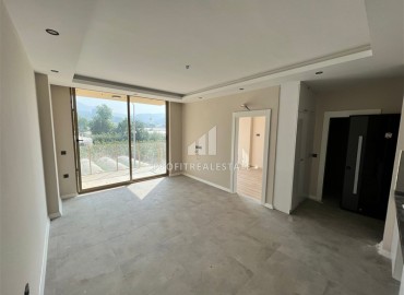 Новая двухкомнатная квартира, 61м², в комплексе с крытым бассейном в районе Алании – Каргыджак, 350м от моря ID-13525 фото-3