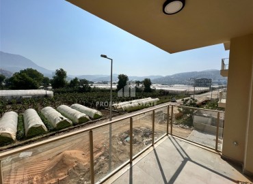 Новая двухкомнатная квартира, 61м², в комплексе с крытым бассейном в районе Алании – Каргыджак, 350м от моря ID-13525 фото-4
