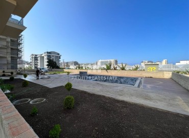 Новая двухкомнатная квартира, 61м², в комплексе с крытым бассейном в районе Алании – Каргыджак, 350м от моря ID-13525 фото-15
