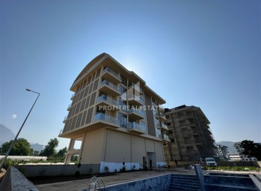 Новая двухкомнатная квартира, 61м², в комплексе с крытым бассейном в районе Алании – Каргыджак, 350м от моря ID-13525 фото-16