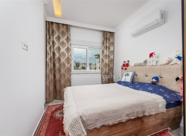Уютная квартира с одной спальней, 55м², в комплексе с бассейном в 800м от моря в Авсалларе, Алания. ID-13547 фото-5