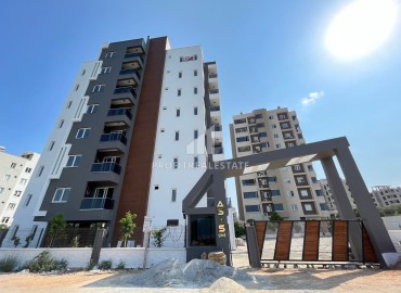 One-bedroom apartment, 50m², in a comfortable residence in Mezitli area, Mersin, Kuyuluk microdistrict ID-13553 фото-1