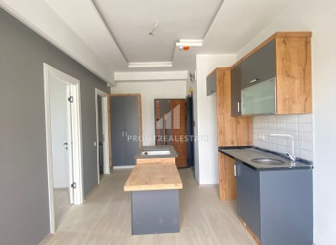 Квартира с одной спальней, 50м², в комфортабельном комплексе в районе Мезитли, Мерсин, микрорайон Куйулук ID-13553 фото-6