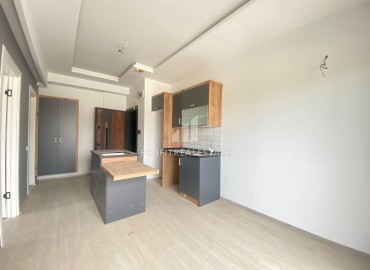 Квартира с одной спальней, 50м², в комфортабельном комплексе в районе Мезитли, Мерсин, микрорайон Куйулук ID-13553 фото-8