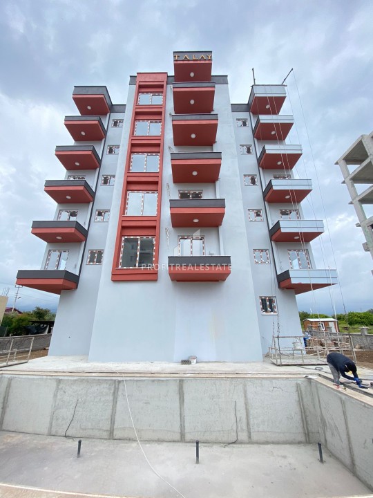 Двухкомнатная квартира, 52м², в комплексе с бассейном на окончательном этапе строительства в Эрдемли, Арпачбахшиш ID-13561 фото-1
