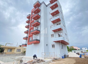 Двухкомнатная квартира, 52м², в комплексе с бассейном на окончательном этапе строительства в Эрдемли, Арпачбахшиш ID-13561 фото-2