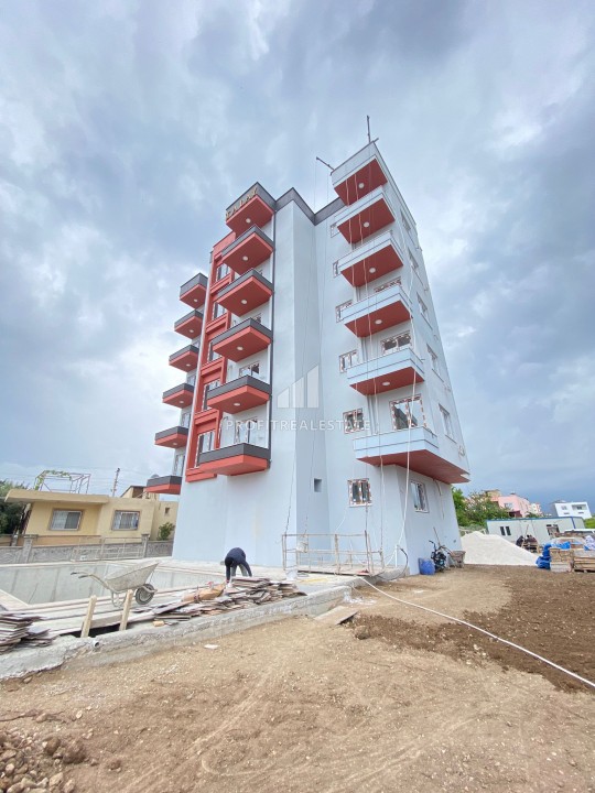 Двухкомнатная квартира, 52м², в комплексе с бассейном на окончательном этапе строительства в Эрдемли, Арпачбахшиш ID-13561 фото-2