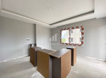 Двухкомнатная квартира, 52м², в комплексе с бассейном на окончательном этапе строительства в Эрдемли, Арпачбахшиш ID-13561 фото-6