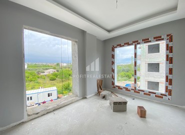 Двухкомнатная квартира, 52м², в комплексе с бассейном на окончательном этапе строительства в Эрдемли, Арпачбахшиш ID-13561 фото-8