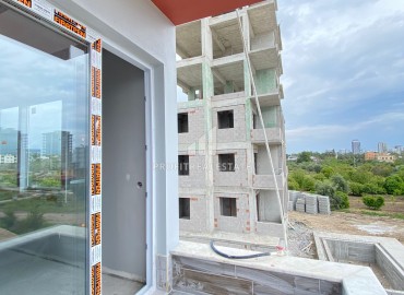 Двухкомнатная квартира, 52м², в комплексе с бассейном на окончательном этапе строительства в Эрдемли, Арпачбахшиш ID-13561 фото-9