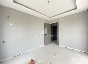 Двухкомнатная квартира, 52м², в комплексе с бассейном на окончательном этапе строительства в Эрдемли, Арпачбахшиш ID-13561 фото-15