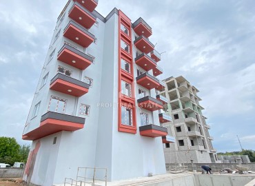 Двухкомнатная квартира, 52м², в комплексе с бассейном на окончательном этапе строительства в Эрдемли, Арпачбахшиш ID-13561 фото-16