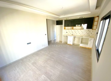 Квартира 1+1, 45м², с чистовой отделкой в новом комплексе с инфраструктурой в районе Томюк, Мерсин ID-13562 фото-2