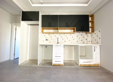 Квартира 1+1, 45м², с чистовой отделкой в новом комплексе с инфраструктурой в районе Томюк, Мерсин ID-13562 фото-4