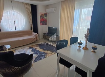 Меблированная квартира на аренду с одной спальней, 75 м² в 150м от моря в Махмутларе, Алания ID-13566 фото-1