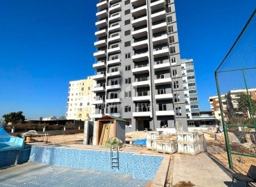 One-bedroom apartment, 55m², in a new comfortable residence in the Tomyuk area, Mersin ID-13579 фото-1