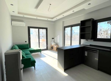 Квартира с одной спальней, 55м², в новом комфортабельном комплексе в районе Томюк, Мерсин ID-13579 фото-2