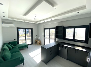 Квартира с одной спальней, 55м², в новом комфортабельном комплексе в районе Томюк, Мерсин ID-13579 фото-4