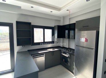 Квартира с одной спальней, 55м², в новом комфортабельном комплексе в районе Томюк, Мерсин ID-13579 фото-5