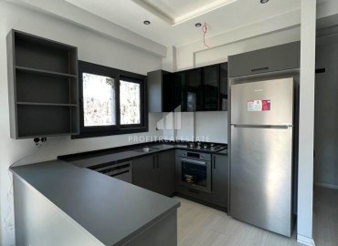 Квартира с одной спальней, 55м², в новом комфортабельном комплексе в районе Томюк, Мерсин ID-13579 фото-6