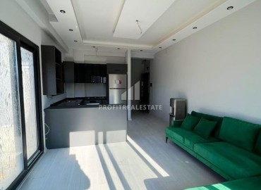 Квартира с одной спальней, 55м², в новом комфортабельном комплексе в районе Томюк, Мерсин ID-13579 фото-7