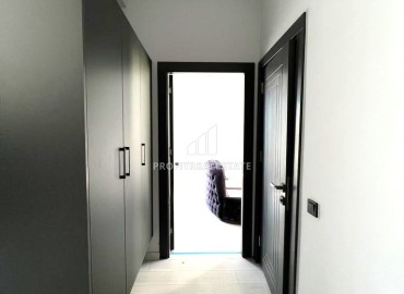 Квартира с одной спальней, 55м², в новом комфортабельном комплексе в районе Томюк, Мерсин ID-13579 фото-8