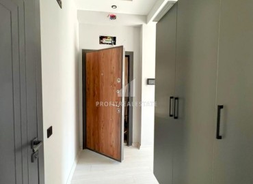 Квартира с одной спальней, 55м², в новом комфортабельном комплексе в районе Томюк, Мерсин ID-13579 фото-9