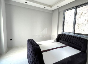 Квартира с одной спальней, 55м², в новом комфортабельном комплексе в районе Томюк, Мерсин ID-13579 фото-11