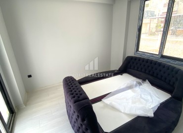 Квартира с одной спальней, 55м², в новом комфортабельном комплексе в районе Томюк, Мерсин ID-13579 фото-12