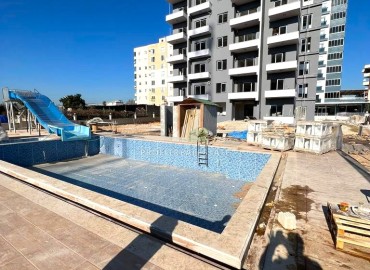 One-bedroom apartment, 55m², in a new comfortable residence in the Tomyuk area, Mersin ID-13579 фото-13