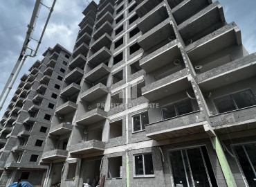 Двухкомнатные апартаменты, 65м², в строящемся комплексе с бассейном в районе Томюк, Мерсин ID-13583 фото-16