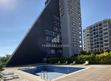 Двухкомнатная квартира, 50м², в комплексе с бассейном в микрорайоне Чифтликкёй района Енишехир, Мерсин ID-13608 фото-2