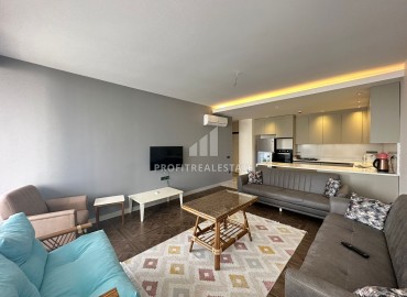 View furnished one-bedroom apartment, 89m², in a new residence with facilities in Arpacbakhshish, Erdemli ID-13611 фото-4