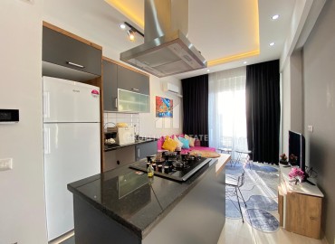 Меблированная квартира с одной спальней, 50м², в новом комплексе в районе Мезитли, Мерсин ID-13613 фото-4