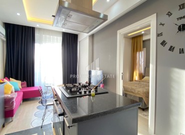 Меблированная квартира с одной спальней, 50м², в новом комплексе в районе Мезитли, Мерсин ID-13613 фото-5