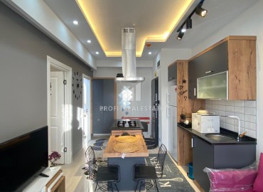 Меблированная квартира с одной спальней, 50м², в новом комплексе в районе Мезитли, Мерсин ID-13613 фото-7