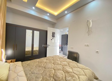 Меблированная квартира с одной спальней, 50м², в новом комплексе в районе Мезитли, Мерсин ID-13613 фото-12