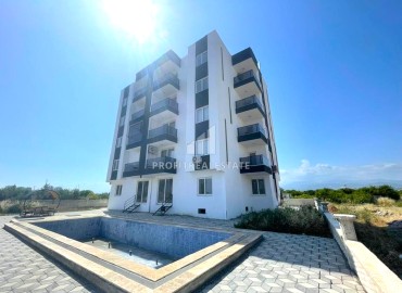 Двухкомнатная квартира, 55м², с видом на море, в новом комплексе в Чешмели, Мерсин, по отличной цене ID-13614 фото-1