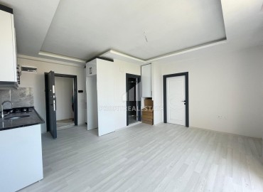 Двухкомнатная квартира, 55м², с видом на море, в новом комплексе в Чешмели, Мерсин, по отличной цене ID-13614 фото-2