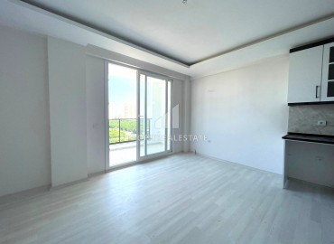 One-bedroom apartment, 55m², with sea view, in a new residence in Cesmeli, Mersin, at a great price ID-13614 фото-5