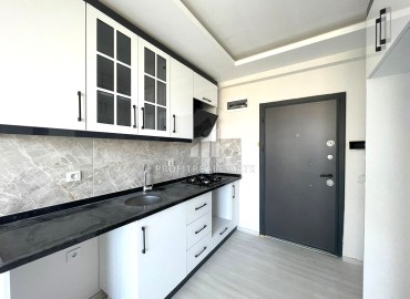 Двухкомнатная квартира, 55м², с видом на море, в новом комплексе в Чешмели, Мерсин, по отличной цене ID-13614 фото-6