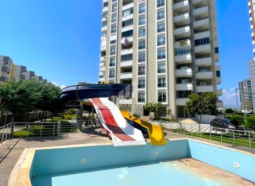 Furnished apartment 1 + 1, 60m², in a residence with a water park, by the sea, in Teje area, Mersin ID-13615 фото-19