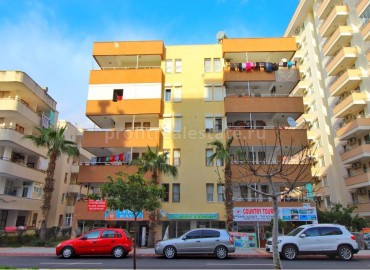 Квартира планировки 2+1 на высоком этаже по очень низкой цене всего в 150 метрах от муниципальных пляжей района Махмутлар ID-1055 фото-1}}
